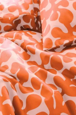 Påslakanset|Jotex KNOTA Påslakanset Enkelsäng Ekologisk Persika/orange